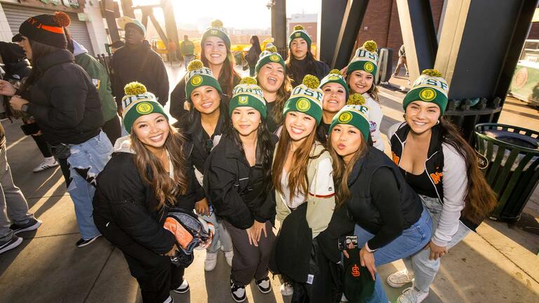 Fans sporting their beanies on the stadium concourse