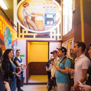 Students tour a colorful part of the history of the Mission district.