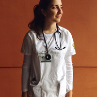 Kayla wearing scrubs and a stethoscope around her neck