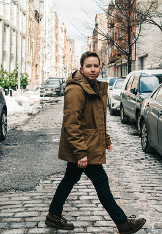 Lucas Waldron crossing a street in New York