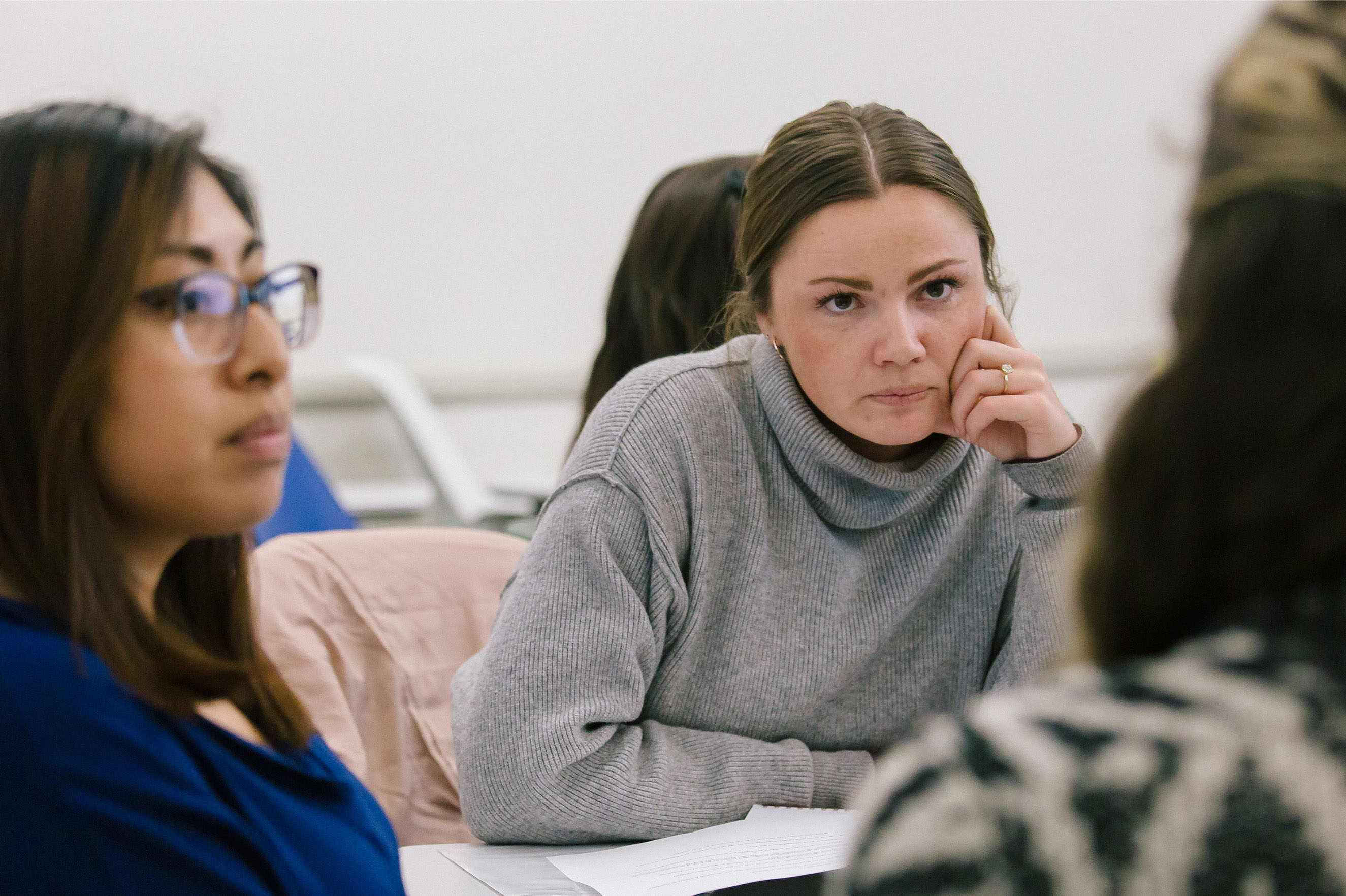 Student listens intently to an instructor.