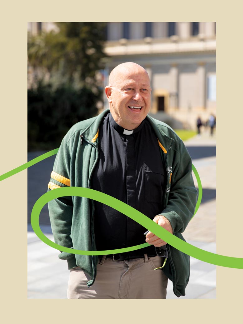 Donal Godfrey on front of St Ignatius church surrounded by a green line