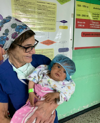 Nurse holding a child