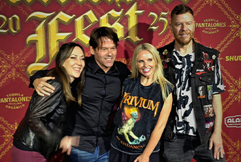 Michael P. Vasicek ’01 posing on the red carpet for Fantastic Fest