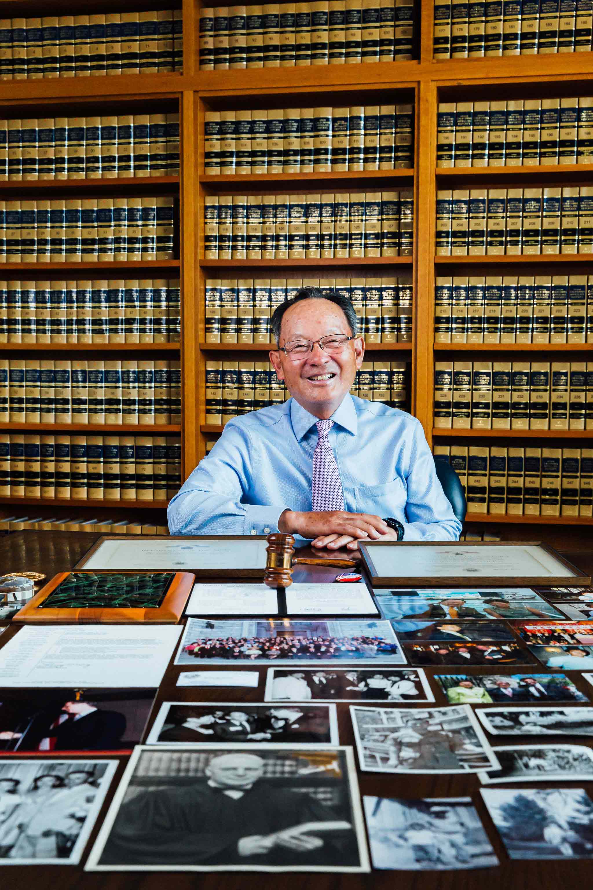 Justice Ming Chin with family photos