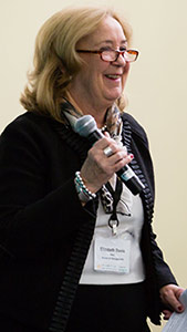 School of Management Dean Elizabeth Davis addressed attendees during the symposium’s welcome remarks, emphasizing the opportunities the event offers