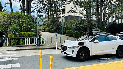 Waymo car outside of USF campus