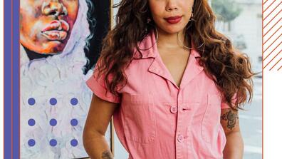 Photo of Taylor Smalls in a gallery of her artwork