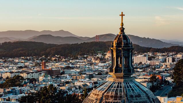 Dome of St Ignatius Church with the city behind.