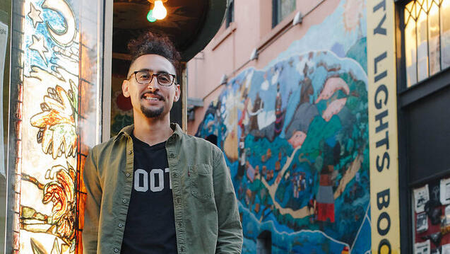 Alan Chazaro in front of City Light Books