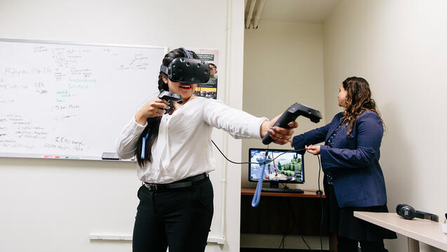 Student using VR equipment in class