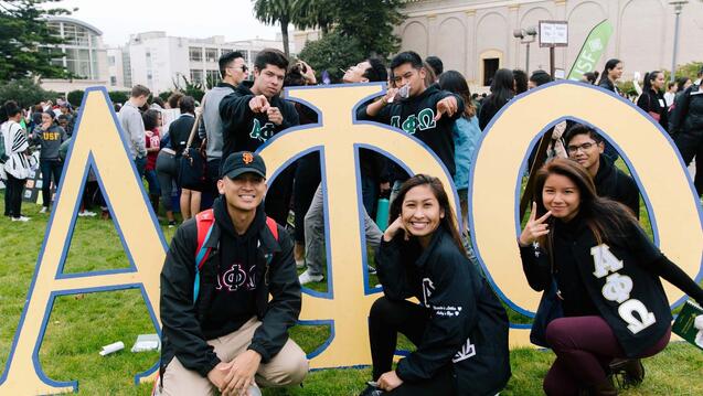 An outside Greek life recruitment event 