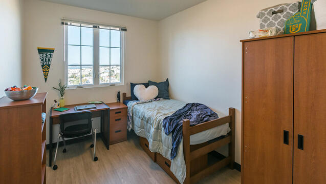 bed and desk in lone mountain east residence hall