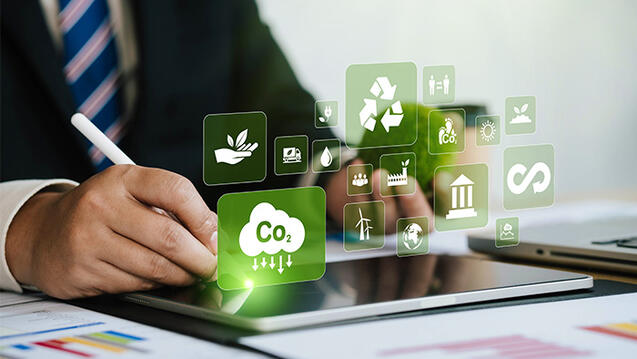 A person using a tablet with floating eco-friendly icons