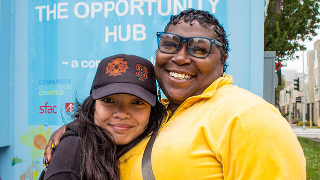 student smiles with fillmore resident