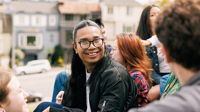 students hanging out outside on usf campus