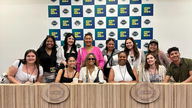 USF students posing at Melbourne Cricket Ground