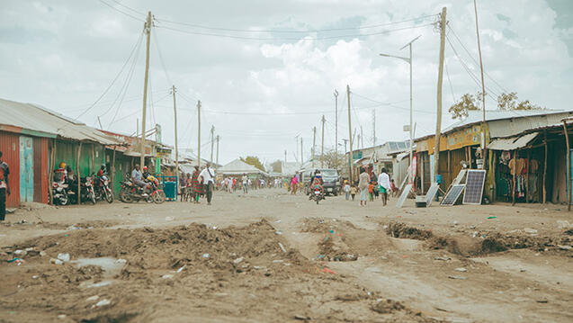 residents walk around kakuma refugee camp