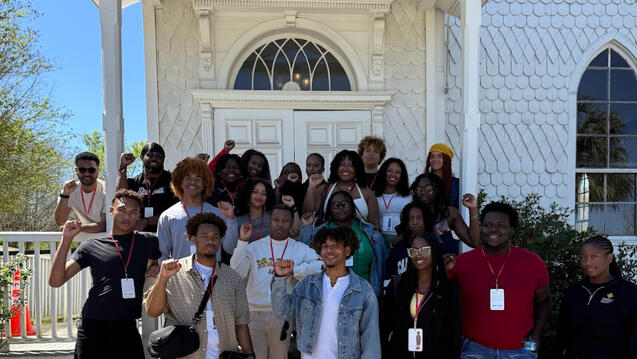 Group of students outside the Whitney Plantation in Louisiana