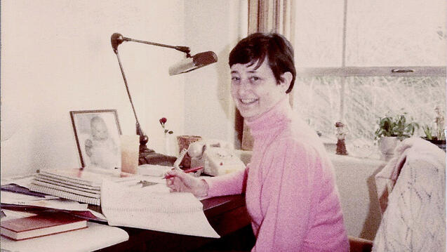 Mary Jo Clark working at desk at Medical College of Georgia