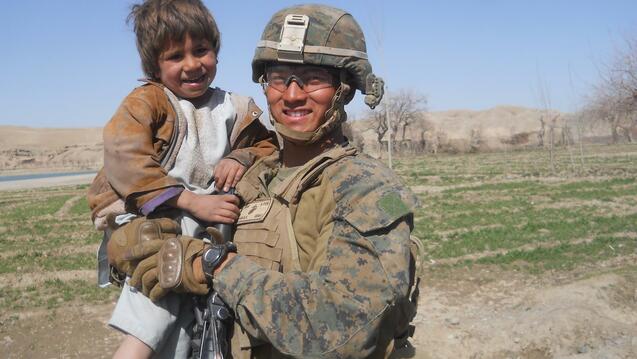 David Pham MAPL ’22 with an Afghani child