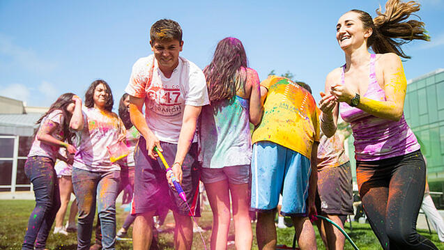 Read the story: In Living Color: USFers Painted Head to Toe in Holi Festival 