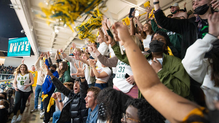 USF students cheering at a basketball game