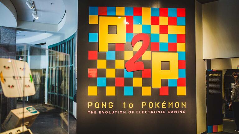 Exhibition poster reading Pong to Pokemon.