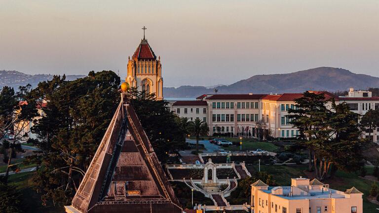 Rooftops of USF buildings with Lone Mountain in the background.