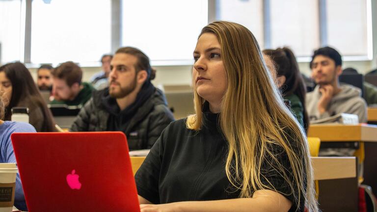 Student pays attention during a class lecture.