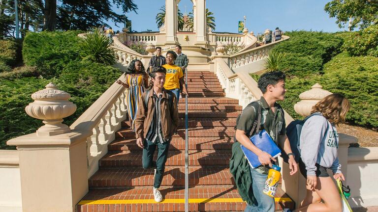Students descend the Lone Mountain stairs.