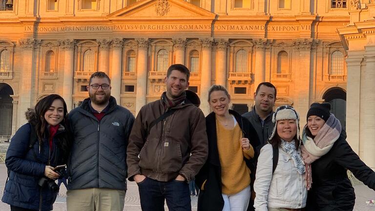 Students in a plaza in Rome.