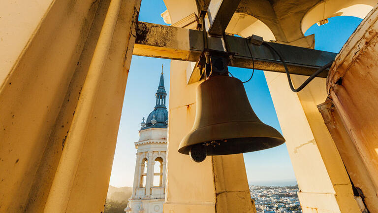 View of church bell from inside tower