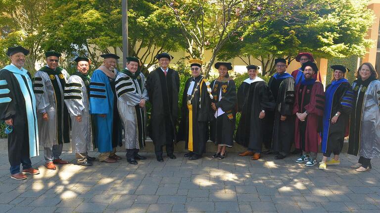 USF Leadership wearing regalia for graduation ceremonies