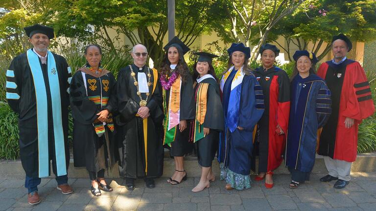 USF Leadership wearing regalia for graduation ceremonies