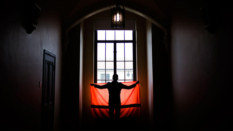 Meron Semedar holding a flag