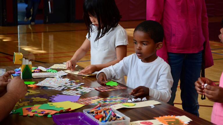 Two children doing learning activities
