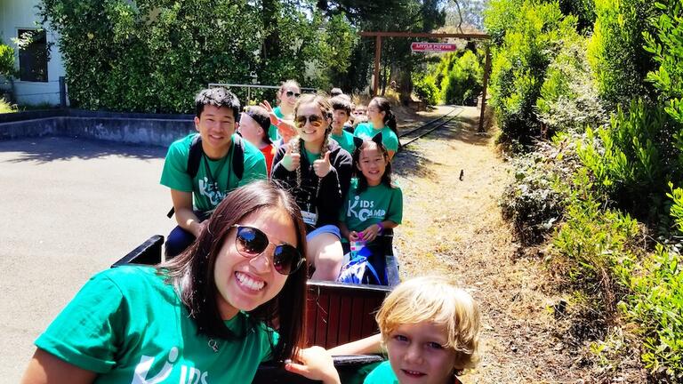 Koret staff with kids on a train