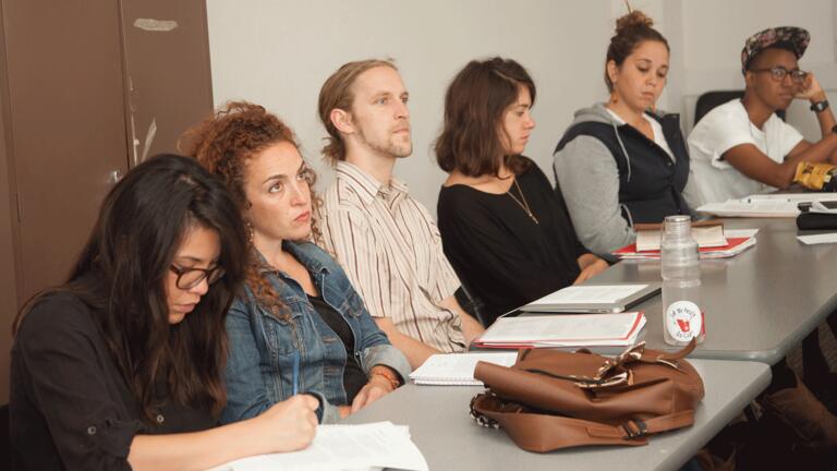 Row of students listening during a class