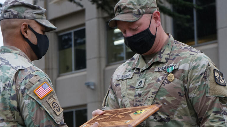 ROTC member being given an award