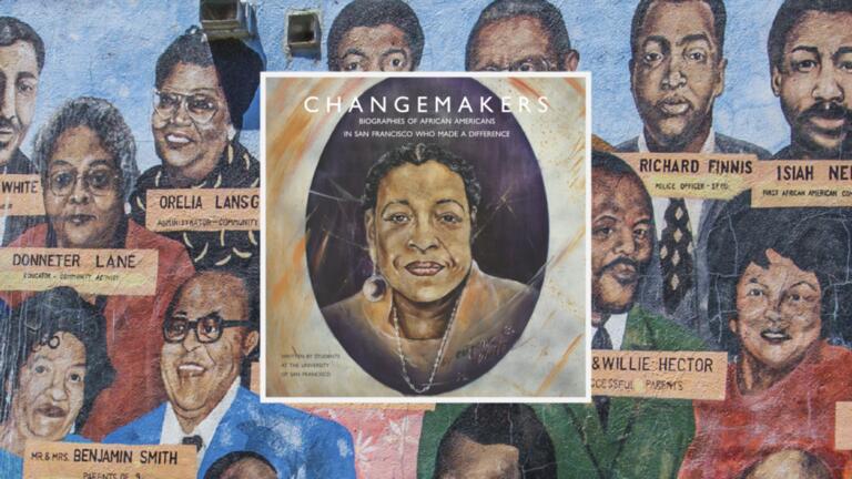 faces on mural with portrait of woman in the middle