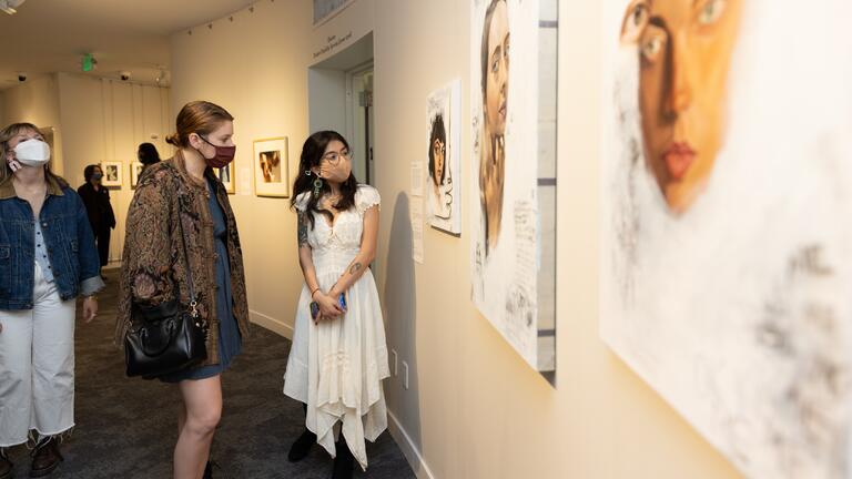 Students looking at an exhibit