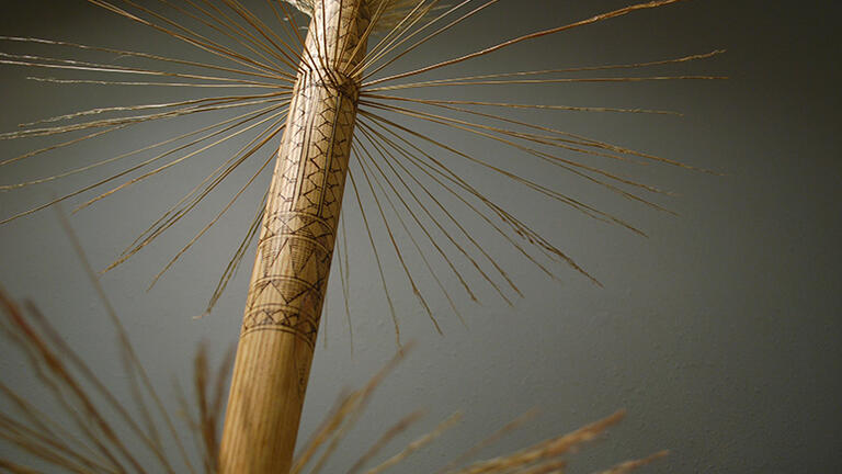 Headhunter’s Broom (Ceremonial Cleansing), Pyrography on wood and hay, 2015