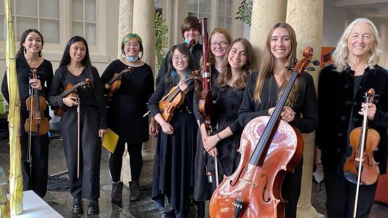 Student musicians posed with their ensemble director