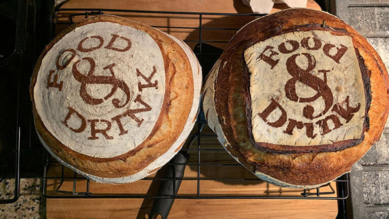Two breads at photoshoot with imprint that reads "Food & Drink"