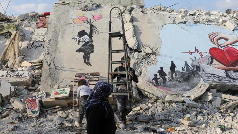 Hopeful graffiti on earthquake rubble