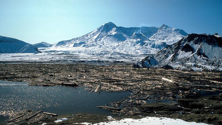 Lake with volcano in background