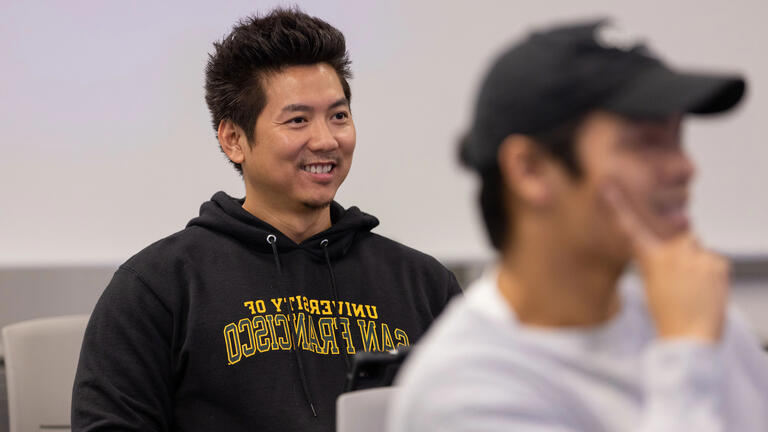 USF student smiling in class