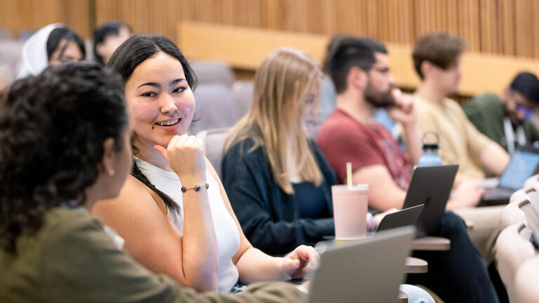 Students sitting in a classroom.