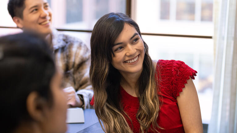 student smiling in classroom